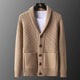 Textured knitted cardigan with shawl collar, buttons and patch pockets