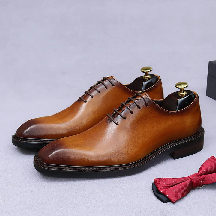 Men's wholecut lace-up Oxford shoes with a burnished finish and square toe