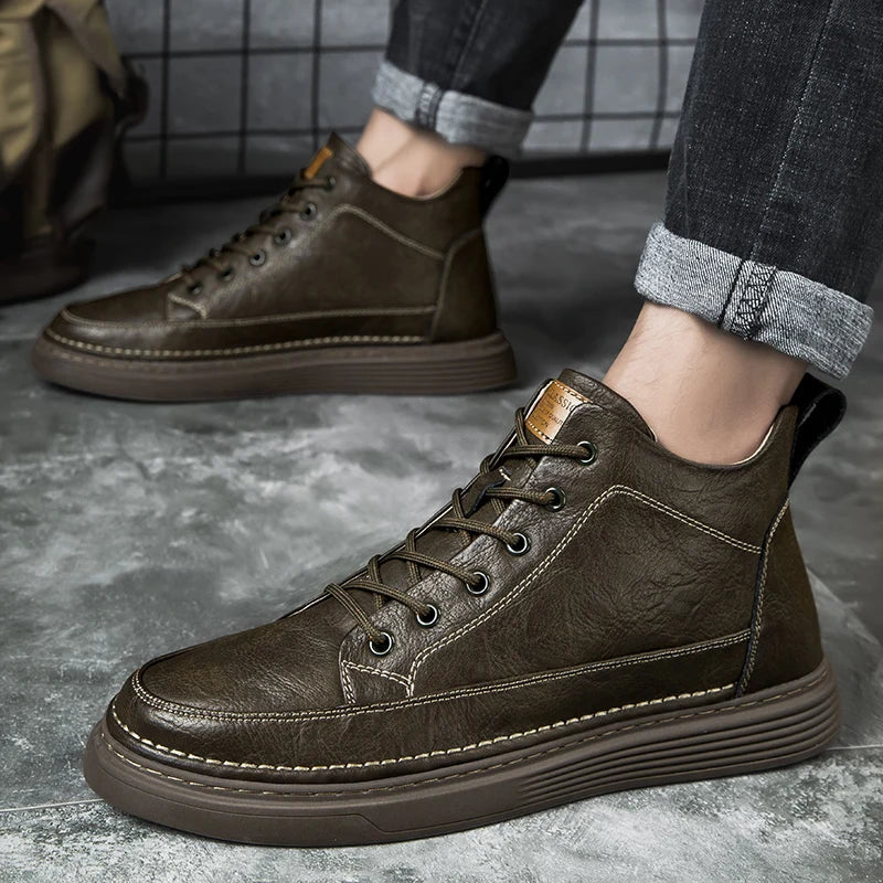 Men's lace-up ankle boots with stitched panels and platform sole