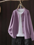 Women's ribbed knit cardigan with pearl-style buttons