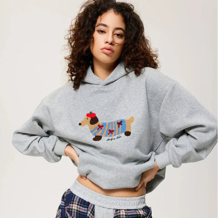 Women's hoodie with dog graphic and kangaroo pocket
