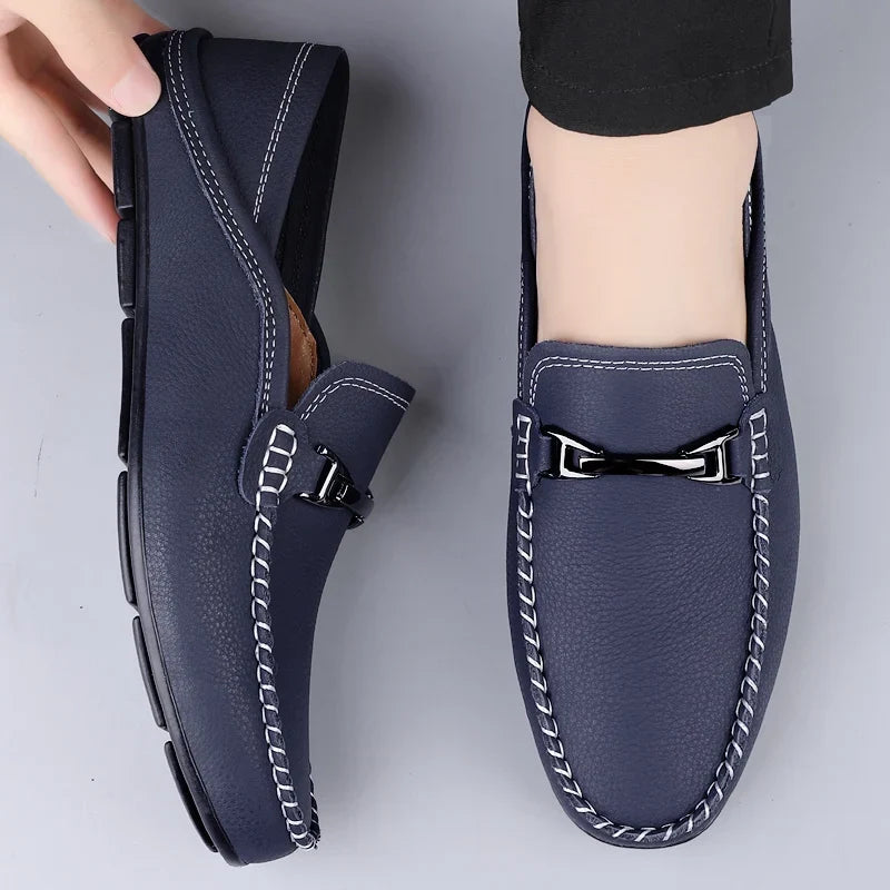 Men's slip-on loafers with moc toe stitching and metal bit detail