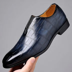 Men's glossy crocodile-effect slip-on loafers with a rounded toe and low block heel