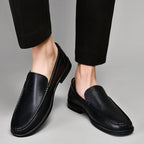 Men's slip-on moc toe loafers in black and brown