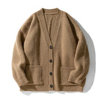 Women's oversized ribbed V-neck cardigan with buttons and patch pockets