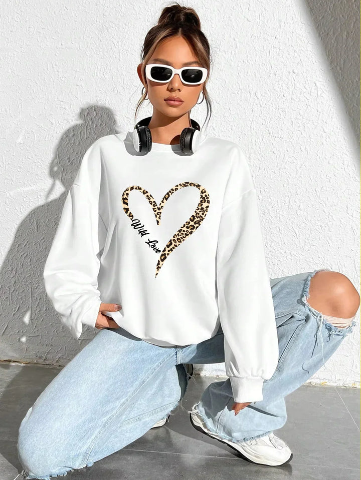 Women's crew-neck sweatshirt with leopard heart graphic and long sleeves