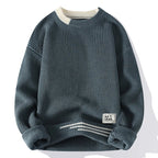 Women's textured crew neck sweater with long sleeves