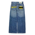 Blue Batman graphic jeans with wide legs and rear pocket patches
