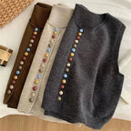 Sleeveless knit vest with scoop neck and multicolour front buttons