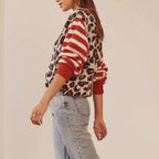 Women's leopard pattern cardigan with long sleeves and button front