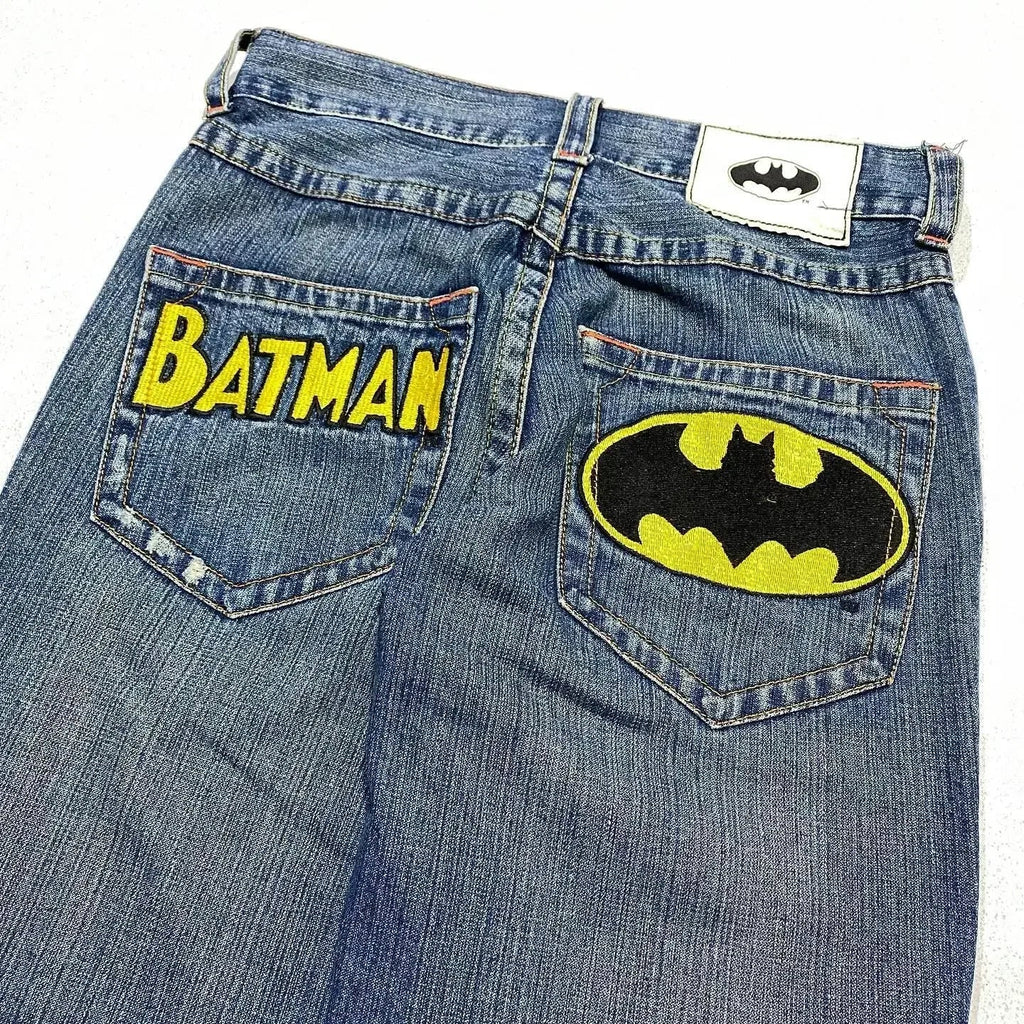 Blue Batman graphic jeans with wide legs and rear pocket patches