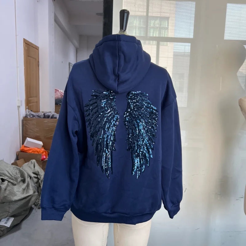 Women's hooded hoodie with large sequin wing motifs on the back