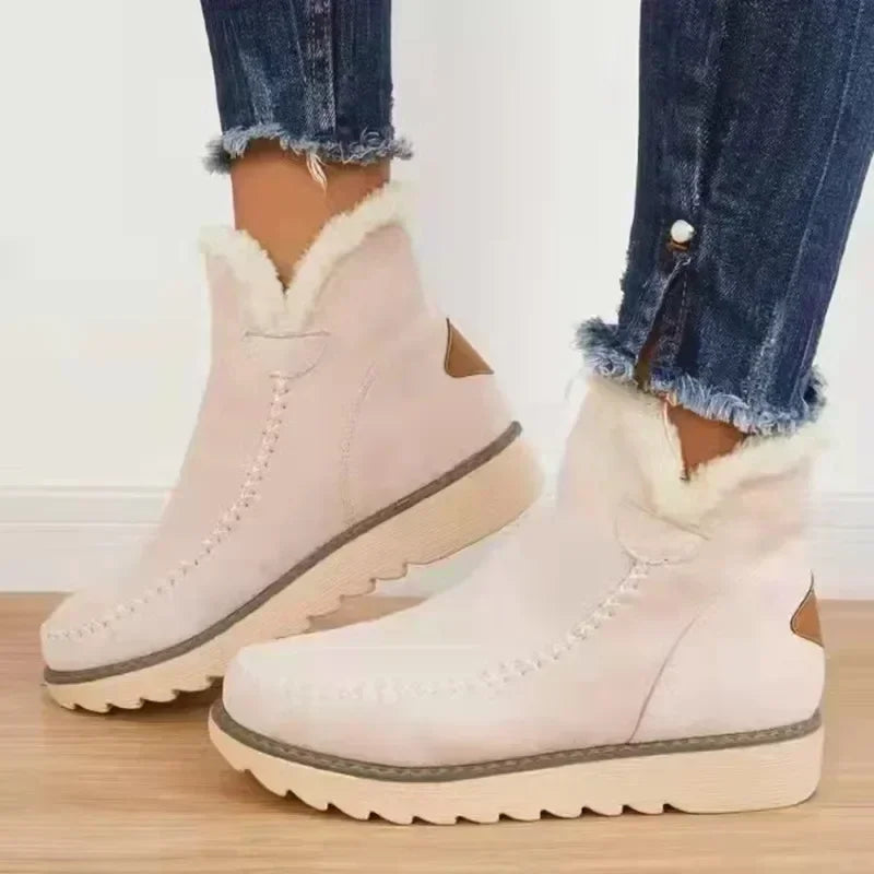 Women's ankle boots with light trim and flat ridged soles