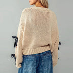 Women's knitted cardigan with ribbon bow ties and long sleeves