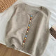 Sleeveless knit vest with scoop neck and multicolour front buttons