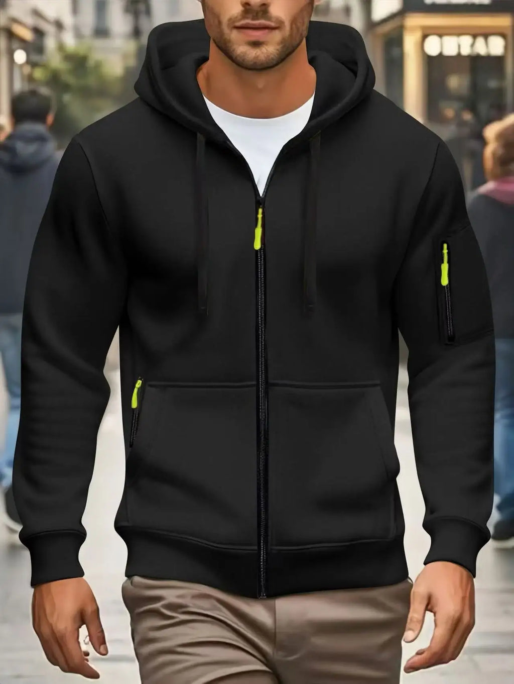 Men's dark green hooded zip-up hoodie with long sleeves and multiple zipped pockets