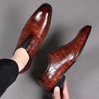 Men's glossy crocodile-effect slip-on loafers with a rounded toe and low block heel