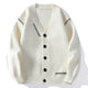 Textured button-front cardigan with V-neckline and contrasting stitched details