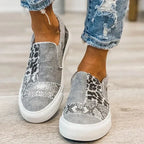 Women's patterned slip-on loafers with round toes and flat white soles