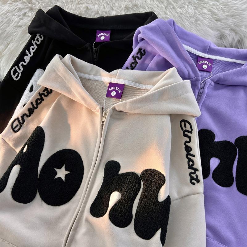 Women's hooded zip-up hoodie with contrasting star appliqué, lettering and front pouch pocket