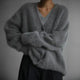 Women's oversized fuzzy V-neck cardigan with long sleeves and button front