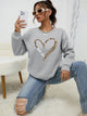 Women's crew-neck sweatshirt with leopard heart graphic and long sleeves
