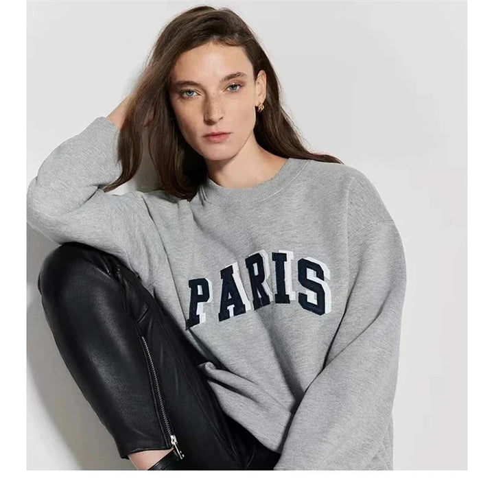Women's crew-neck sweatshirt with long sleeves and embroidered front design