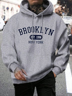 Men's long-sleeve graphic hoodie with drawstring hood and kangaroo pocket