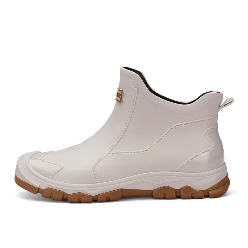Women's Chelsea-style ankle rain boots with round toes and lugged soles