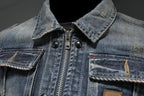 Men's faded blue denim jacket with long sleeves, zip front and chest pockets