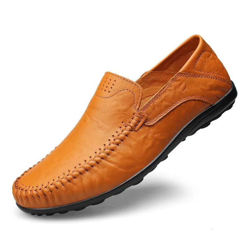 Men's slip-on leather loafers with rounded moc toe and stitched detailing