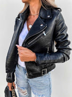 Women's cropped biker jacket with lapels, zips, studs and belted waist