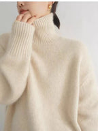 Women's cream turtleneck sweater with ribbed trims
