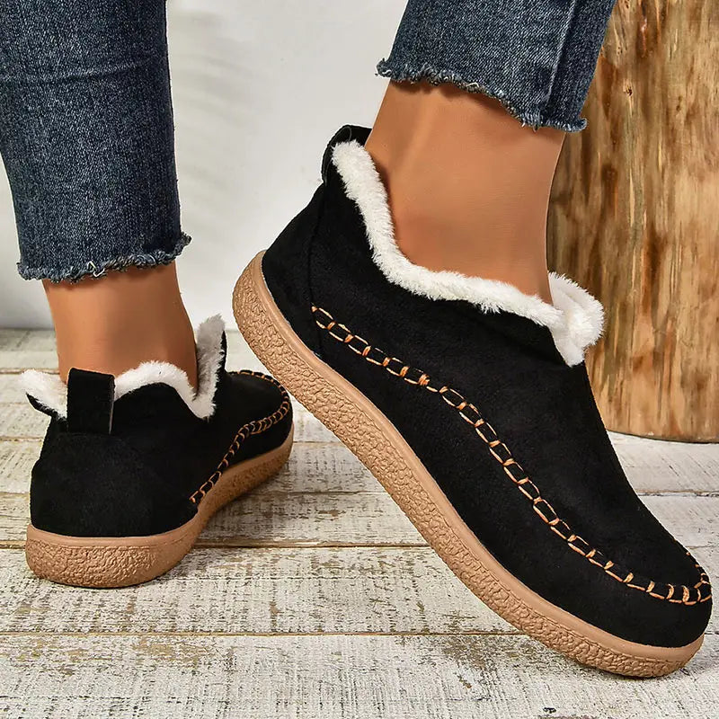 Women's ankle boots with faux fur trim and textured sole