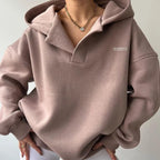 Women's oversized hoodie with attached hood and V-neck opening