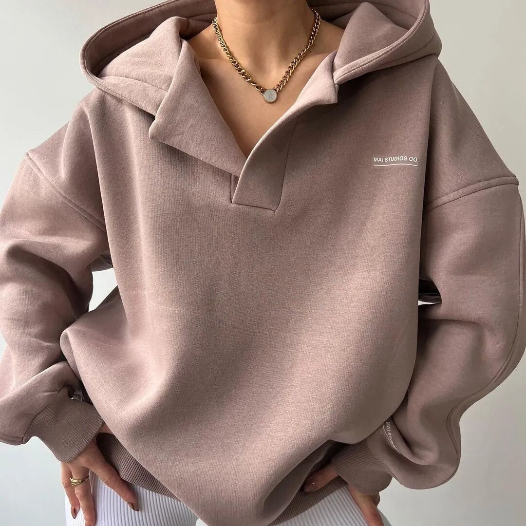 Women's oversized hoodie with attached hood and V-neck opening