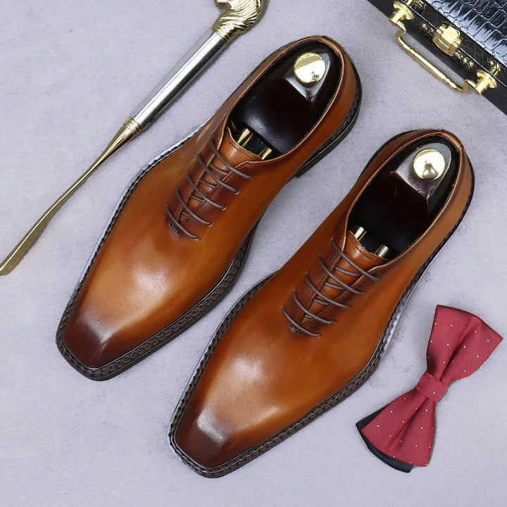 Men's wholecut lace-up Oxford shoes with a burnished finish and square toe