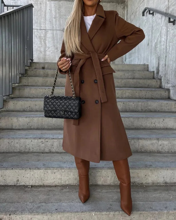 Women's long belted trench coat with notched lapels and double-breasted buttons