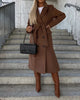 Women's long belted trench coat with notched lapels and double-breasted buttons
