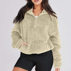 Women's textured hooded half-zip sweater with long sleeves and front pocket