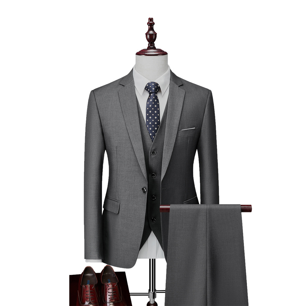 Men's three-piece suit with notch-lapel jacket, buttoned waistcoat and matching trousers