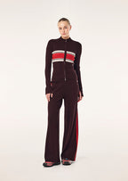 Women's ribbed knit jacket with striped chest and zip front