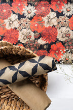 Women's orange shirt, trouser and dupatta set with floral and geometric printed fabric