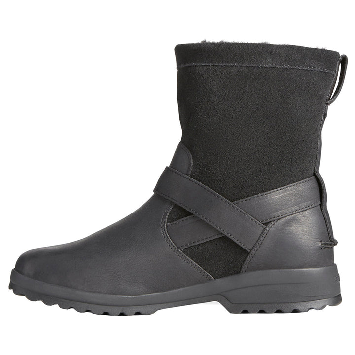 Black pull-on ankle boots with buckle strap and lugged sole