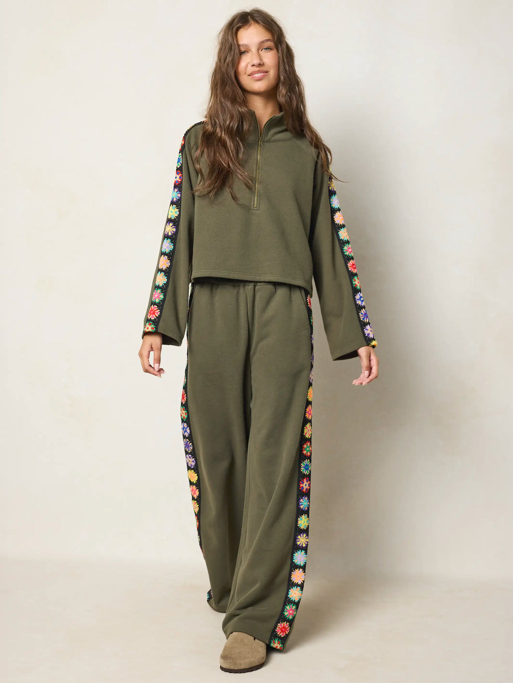 Women's olive half zip sweatshirt with floral sleeve panels