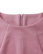 Women's long-sleeve fitted pencil dress with peplum waist and rosette details