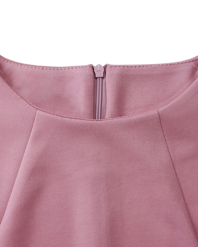 Women's long-sleeve fitted pencil dress with peplum waist and rosette details