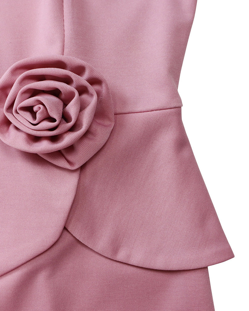 Women's long-sleeve fitted pencil dress with peplum waist and rosette details