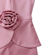 Women's long-sleeve fitted pencil dress with peplum waist and rosette details