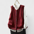 Women's sleeveless V-neck knit vest with colourful buttons